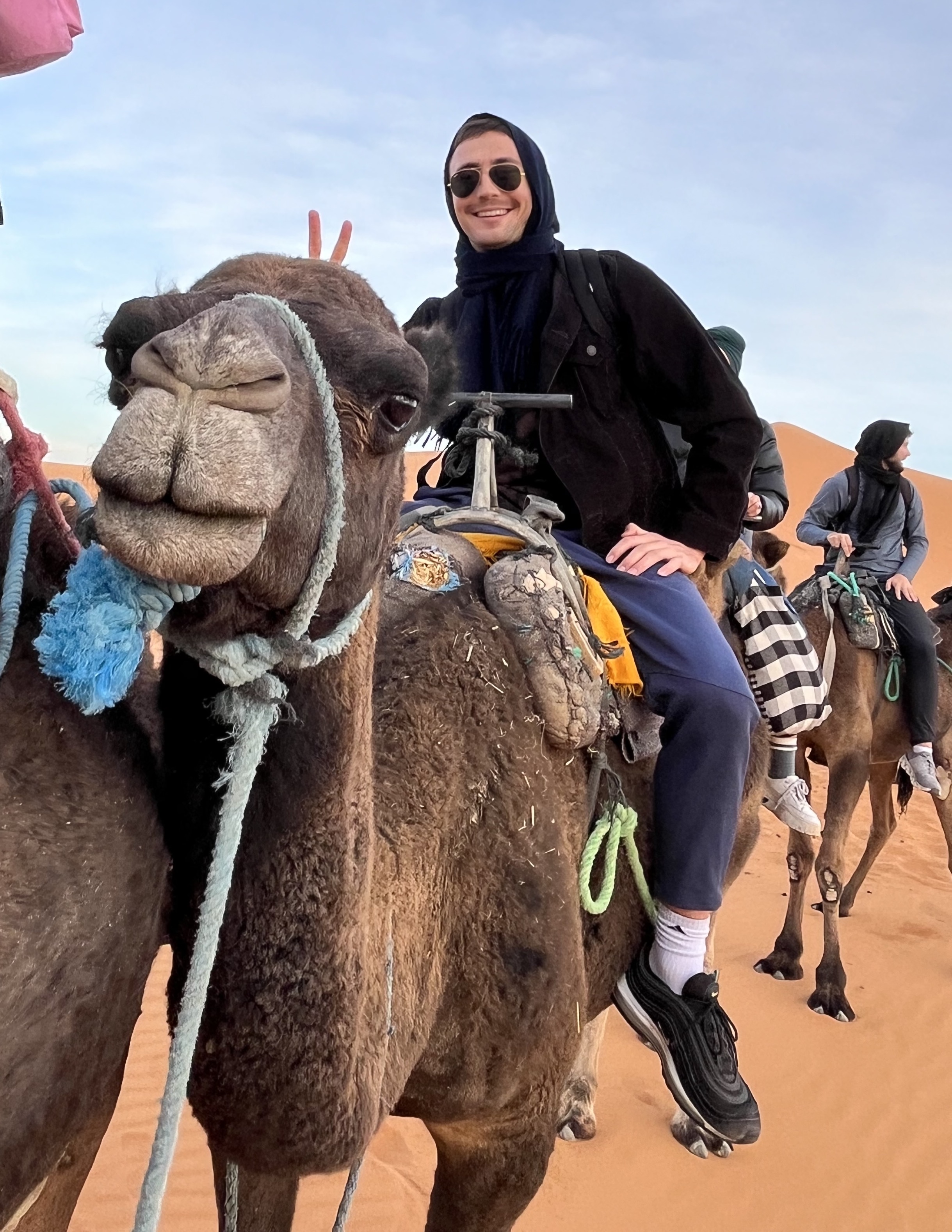 Julian riding a camel